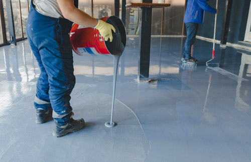 Epoxy Being Poured On Floor